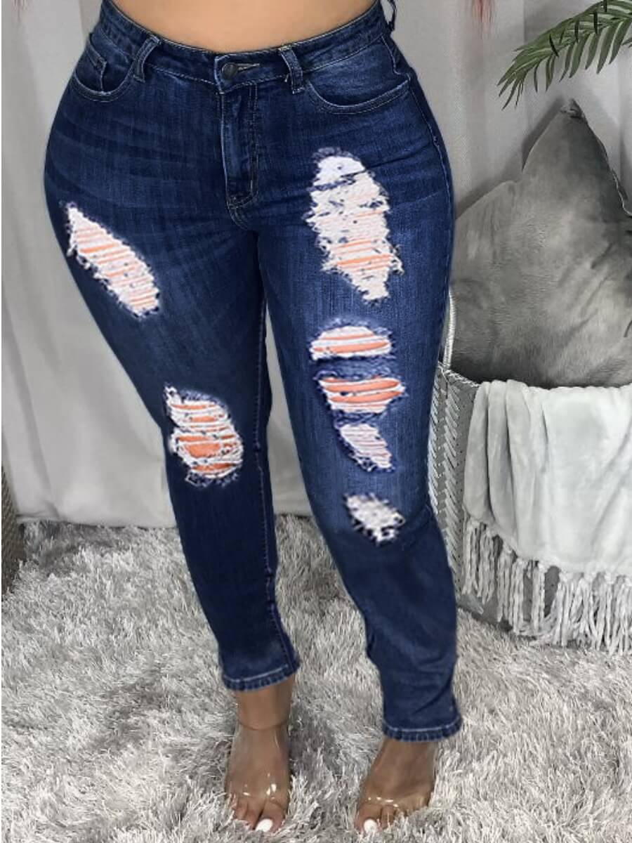 broken holes blue jeans